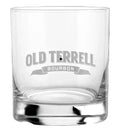 Clear glass whiskey glass with 'Old Terrell Bourbon' engraving on a white background