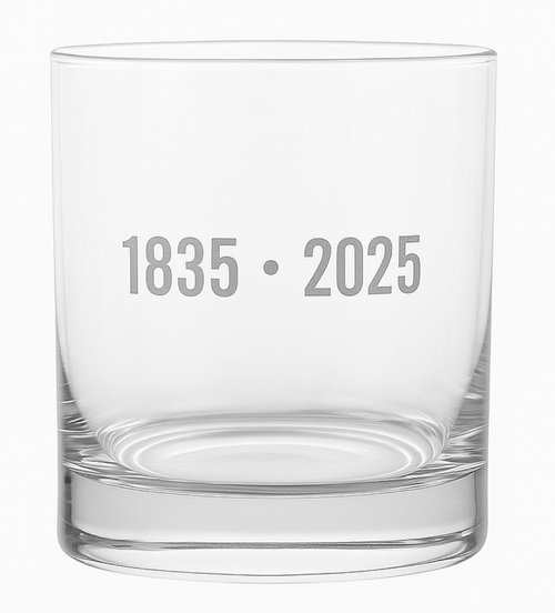 Clear glass tumbler with engraved text '1835 • 2025' on a white background
